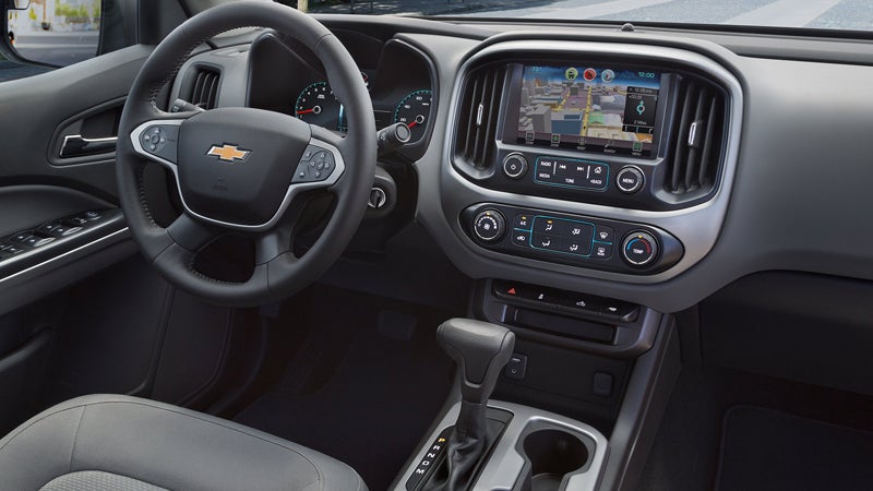 Inside the 2018 Chevrolet Colorado, featuring a contemporary dashboard, comfortable seating