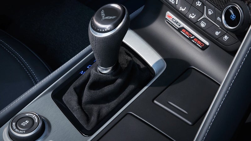 Image of the gear shift in a Chevy Corvette Z06, showcasing its sleek design and advanced features.