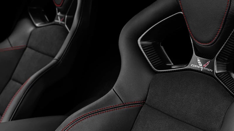 Black sports car seats of a Chevy Corvette Z06, highlighting the vehicle's luxurious and sporty design.