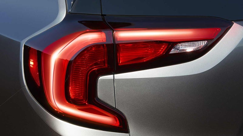 Tail lights of a 2018 GMC Terrain illuminated